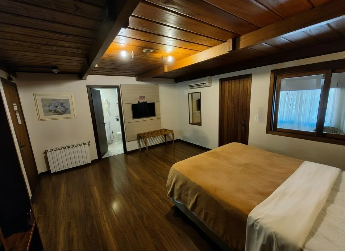 Quarto Deluxe Quádruplo Cama